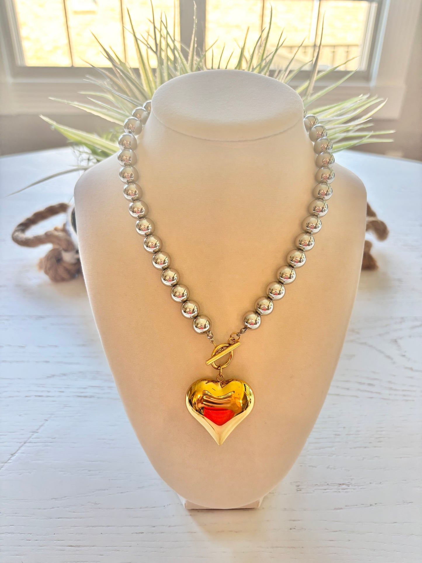 Mixed metal heart necklace
